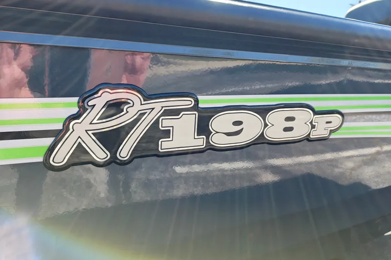 Slide: The Image of Close-up of 2027 Ranger RT198P boat model decal with green stripes. - 4