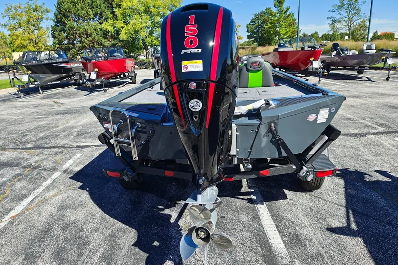Slide: The Image of 2027 Ranger RT198P boat with 150 Pro motor in a parking lot. - 9