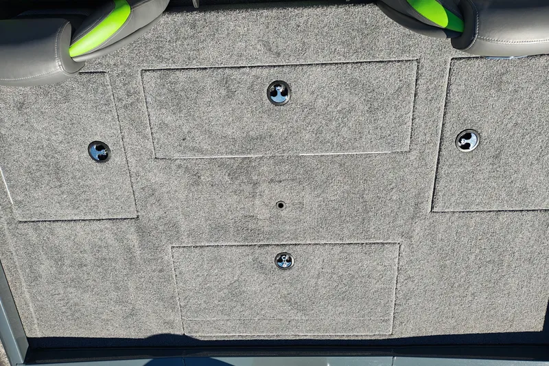 Slide: The Image of Carpeted deck of 2027 Ranger RT198P boat with storage compartments. - 39