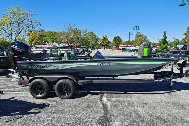 Slide: The Image of 2027 Ranger RT198P boat on trailer in parking lot, sunny day. - 7