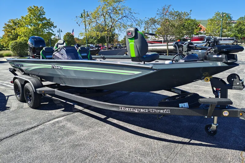 Slide: The Image of 2027 Ranger RT198P boat on trailer, parked outdoors, featuring sleek design and modern equipment. - 46