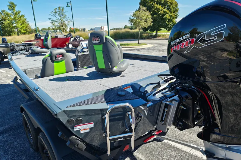 Slide: The Image of 2027 Ranger RT198P boat with Mercury Pro XS engine, featuring sleek design and green-accented seats. - 11
