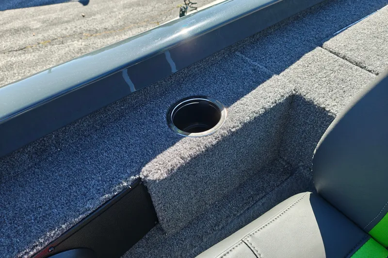 Slide: The Image of Interior of 2027 Ranger RT198P boat with carpeted surface and cup holder. - 24