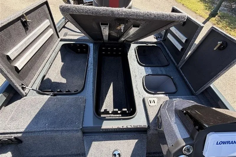 Slide: The Image of 2027 Ranger RT188P boat storage compartments open, showcasing ample space and organization. - 13