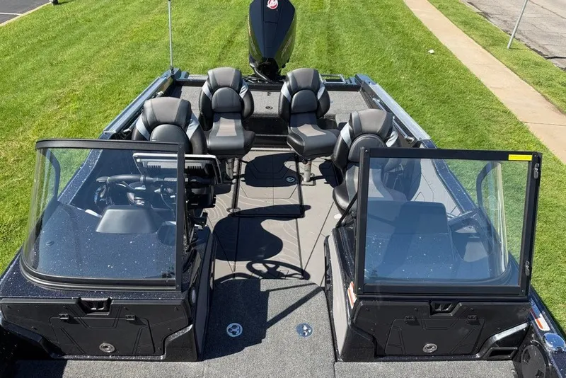 Slide: The Image of 2027 Nitro ZV20 Pro boat with spacious seating and sleek design on grassy area. - 7