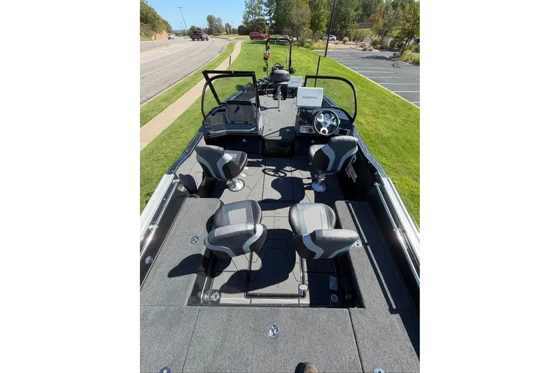 Slide: The Image of 2027 Nitro ZV20 Pro boat interior with four seats and steering console. - 13