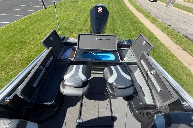 Slide: The Image of 2027 Nitro ZV20 Pro boat interior with open storage compartments and seating. - 14