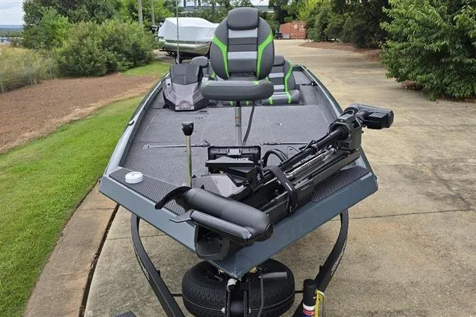 Slide: The Image of 2027 Ranger RT198P fishing boat with modern seating and equipment on a trailer. - 7
