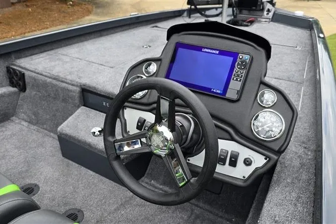 Slide: The Image of 2027 Ranger RT198P boat dashboard with steering wheel and navigation display. - 10