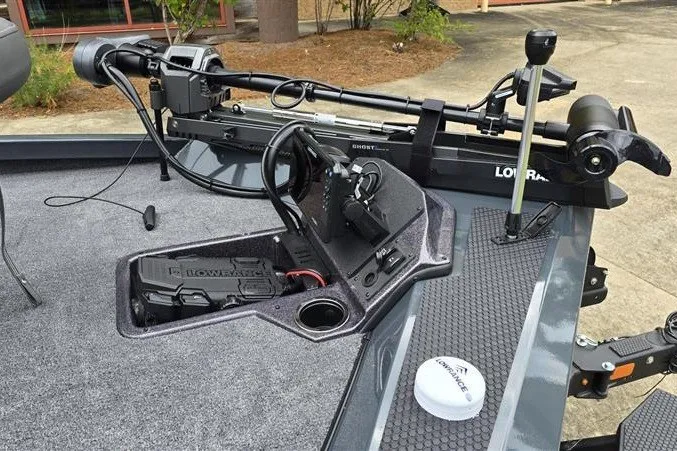 Slide: The Image of 2027 Ranger RT198P boat deck with advanced fishing equipment and Lowrance electronics. - 12