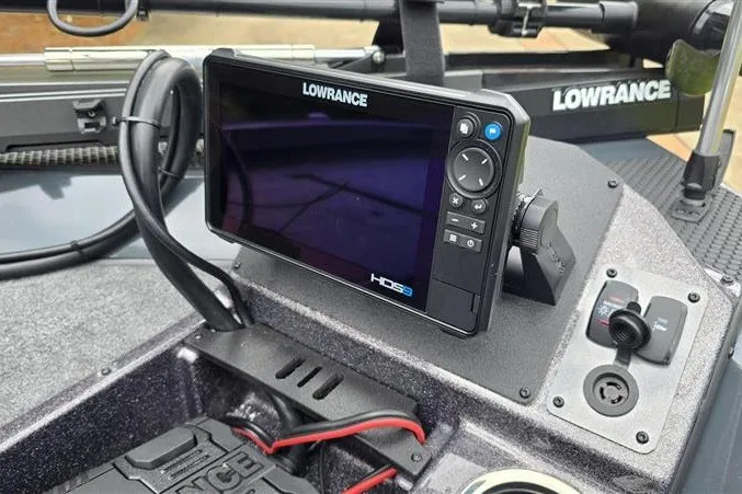 Slide: The Image of Lowrance fishfinder on 2027 Ranger RT198P boat dashboard, featuring advanced navigation technology. - 13
