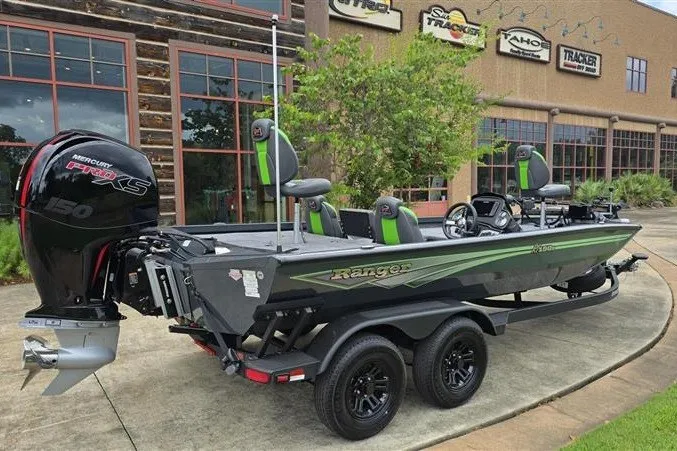 Slide: The Image of 2027 Ranger RT198P fishing boat with Mercury Pro XS engine, parked outside dealership. - 5