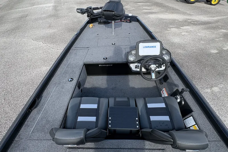 Slide: The Image of 2027 Ranger RT178C boat interior with steering wheel and Lowrance electronics. - 10