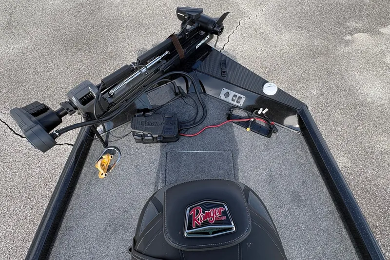 Slide: The Image of 2027 Ranger RT178C boat deck with seat and fishing equipment. - 8