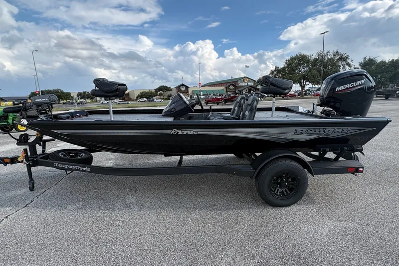 Slide: The Image of 2027 Ranger RT178C fishing boat with Mercury engine on trailer, parked outdoors. - 3
