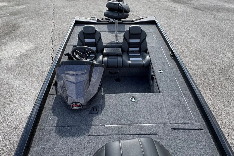 Slide: The Image of 2027 Ranger RT178C fishing boat interior with dual seats and steering console. - 9