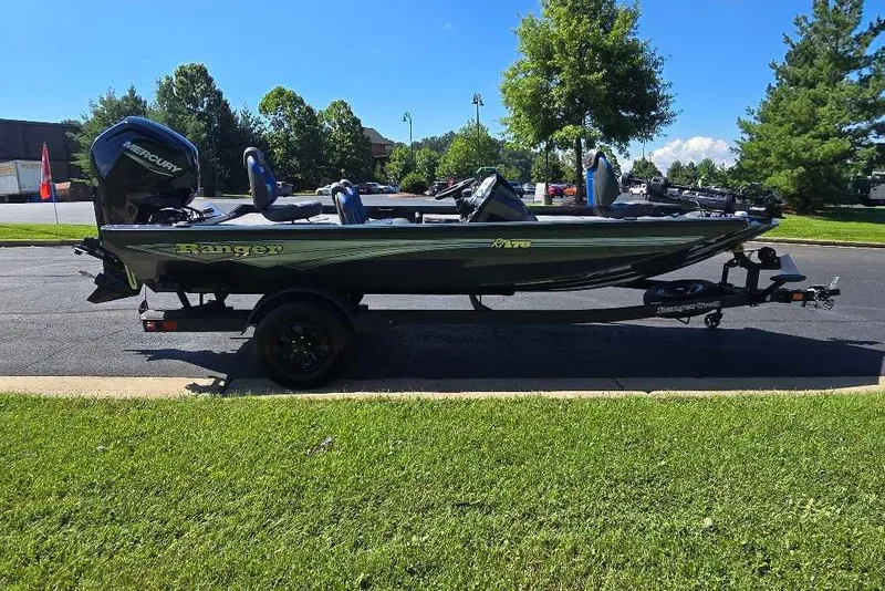 Slide: The Image of 2027 Ranger RT178 boat on trailer, parked outdoors on sunny day. - 3