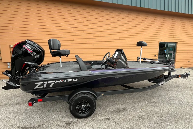 The Image of 2027 Nitro Z17 boat with sleek design and powerful engine, parked outdoors. - 0