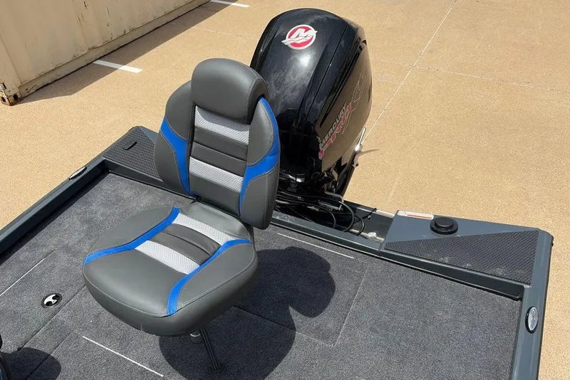 Slide: The Image of 2027 Ranger RT188C boat seat and motor on deck, featuring gray and blue upholstery. - 9