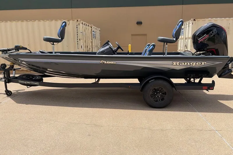 Slide: The Image of 2027 Ranger RT188C fishing boat on trailer, parked outdoors. - 3