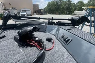Slide: The Image of 2027 Ranger RT188C boat deck with mounted equipment and controls. - 6