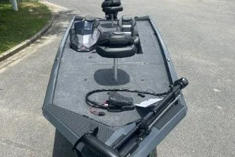 Slide: The Image of 2027 Ranger RT188C fishing boat with seating and equipment on deck. - 2