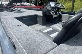 Slide: The Image of 2027 Ranger RT188C boat interior with steering console and seating. - 9