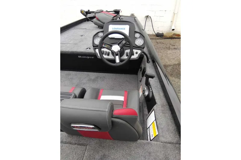 Slide: The Image of 2027 Ranger RT188 boat interior with steering wheel and Lowrance electronics. - 4