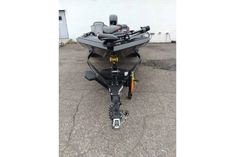 Slide: The Image of 2027 Ranger RT188 boat on trailer, parked on concrete surface. - 1
