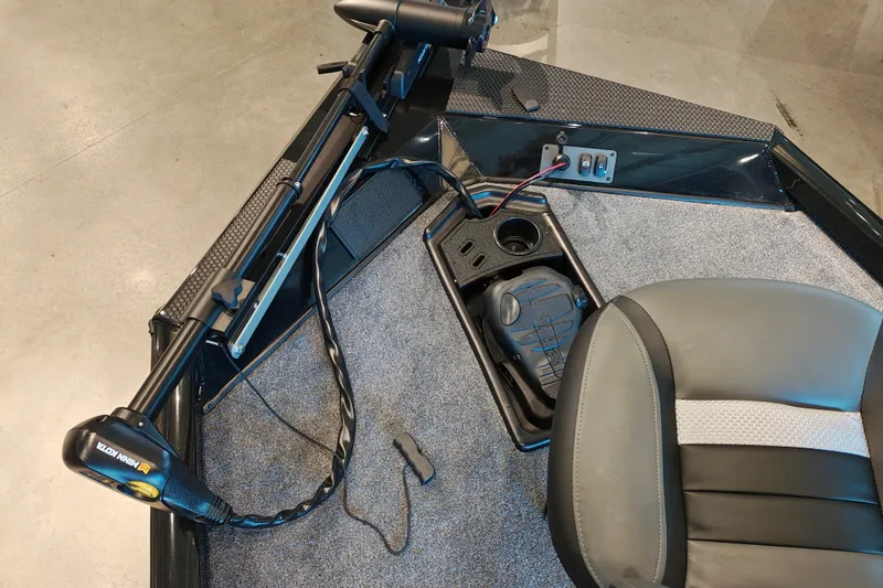 Slide: The Image of 2027 Ranger RT178 boat interior with trolling motor and seating. - 35
