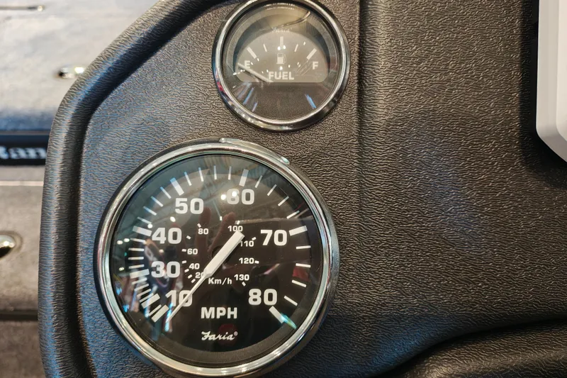 Slide: The Image of Dashboard of 2027 Ranger RT178 with speedometer and fuel gauge. - 18
