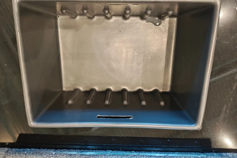 Slide: The Image of Empty storage compartment in a 2027 Ranger RT178 boat. - 29