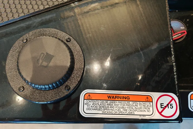 Slide: The Image of Fuel cap and warning label on 2027 Ranger RT178 boat, cautioning against E15 fuel use. - 48