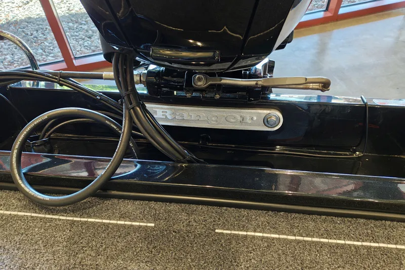 Slide: The Image of 2027 Ranger RT178 boat engine detail with cables and branding. - 50