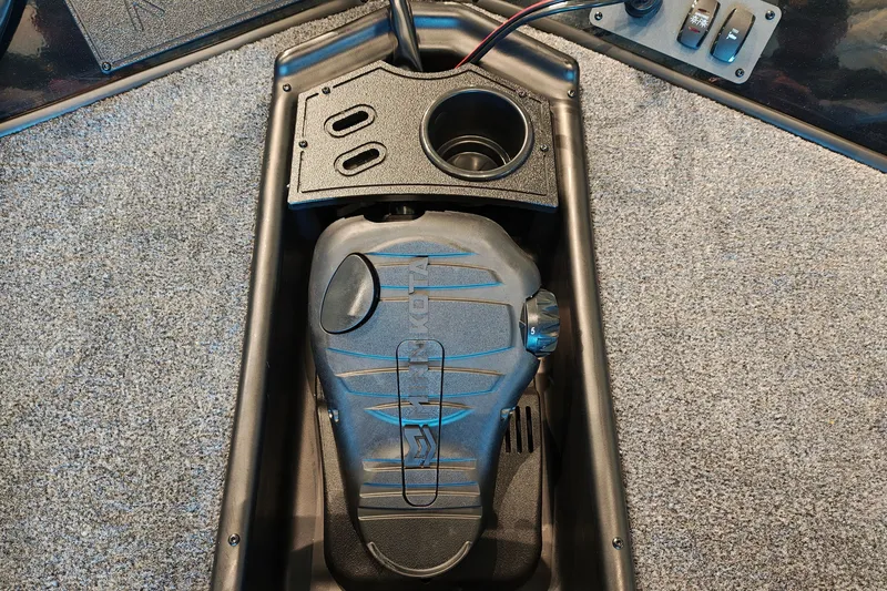 Slide: The Image of 2027 Ranger RT178 boat foot pedal and control panel on carpeted deck. - 36
