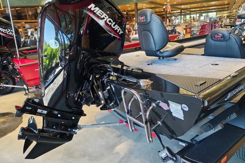 Slide: The Image of 2027 Ranger RT178 boat with Mercury engine in showroom display. - 10