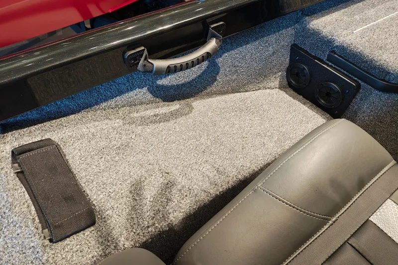 Slide: The Image of Interior of 2027 Ranger RT178 boat, featuring carpeted flooring and seating. - 47