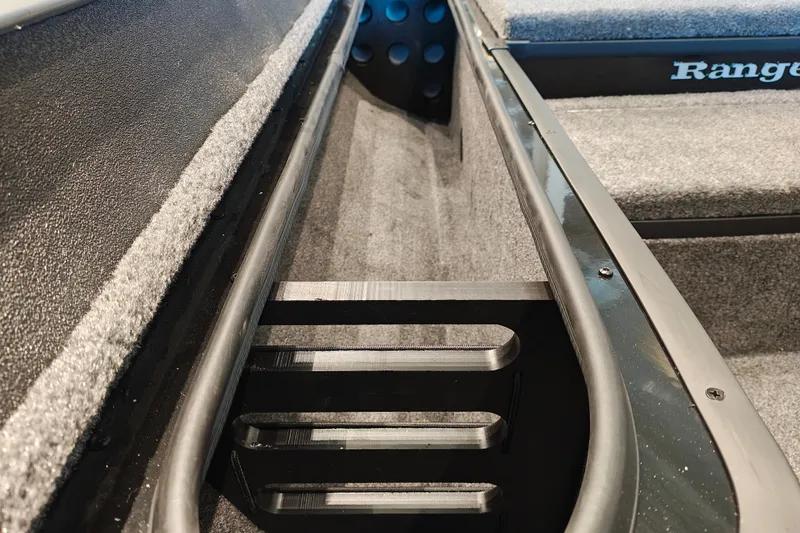 Slide: The Image of Interior view of 2027 Ranger RT178 boat, showcasing storage compartment details. - 32