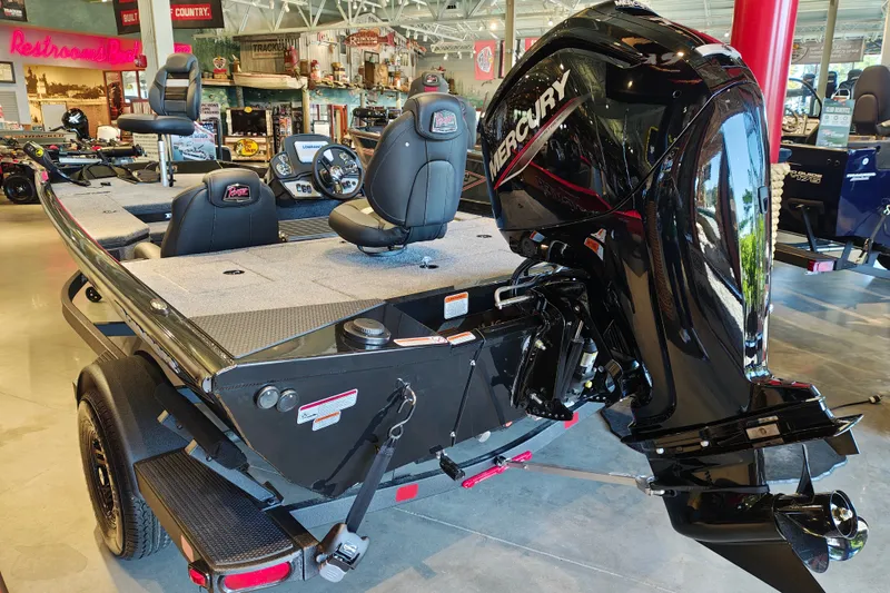 Slide: The Image of 2027 Ranger RT178 boat with Mercury engine displayed in showroom. - 8