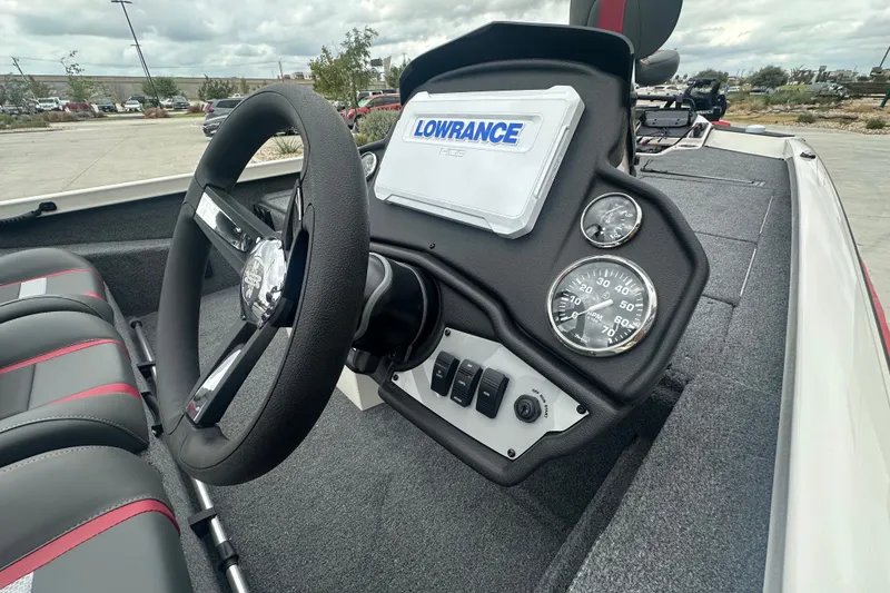 Slide: The Image of 2027 Ranger RT198P boat dashboard with steering wheel and Lowrance GPS system. - 22