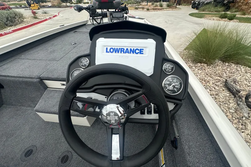 Slide: The Image of Steering console of 2027 Ranger RT198P boat with Lowrance display and gauges. - 21