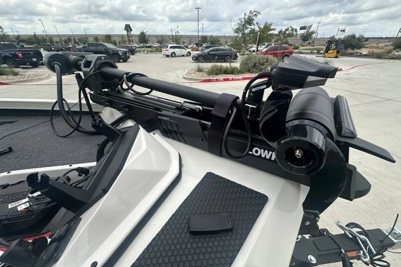 Slide: The Image of 2027 Ranger RT198P boat with advanced trolling motor in a parking lot setting. - 18