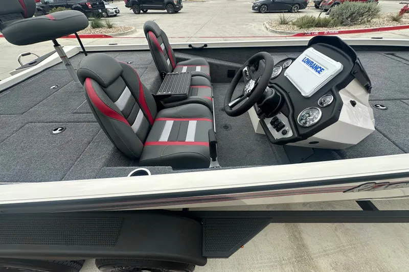 Slide: The Image of 2027 Ranger RT198P boat interior with modern dashboard and seating. - 23