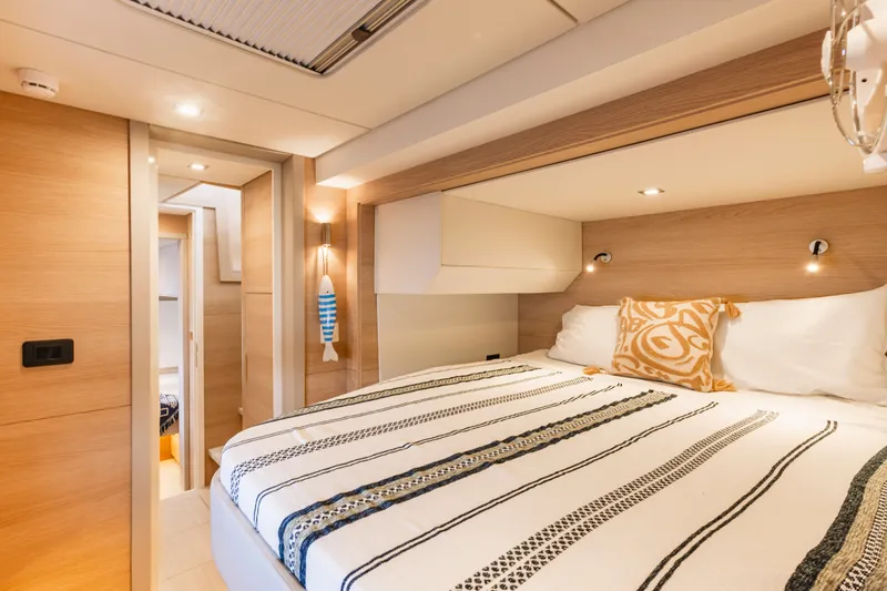 Slide: The Image of Luxurious bedroom interior of 2026 Aventura 56 Motor Yacht with modern design. - 28
