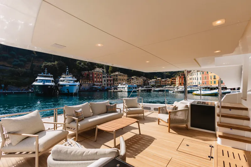 Slide: The Image of Luxurious Aventura 56 Motor Yacht 2026, docked with scenic waterfront view. - 18
