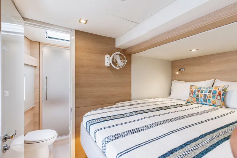 Slide: The Image of Luxurious bedroom and bathroom in 2026 Aventura 56 Motor Yacht, featuring modern design. - 31