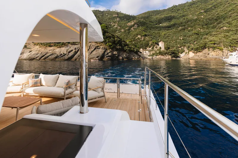 Slide: The Image of Luxurious 2026 Aventura 56 Motor Yacht cruising near scenic coastal cliffs. - 26