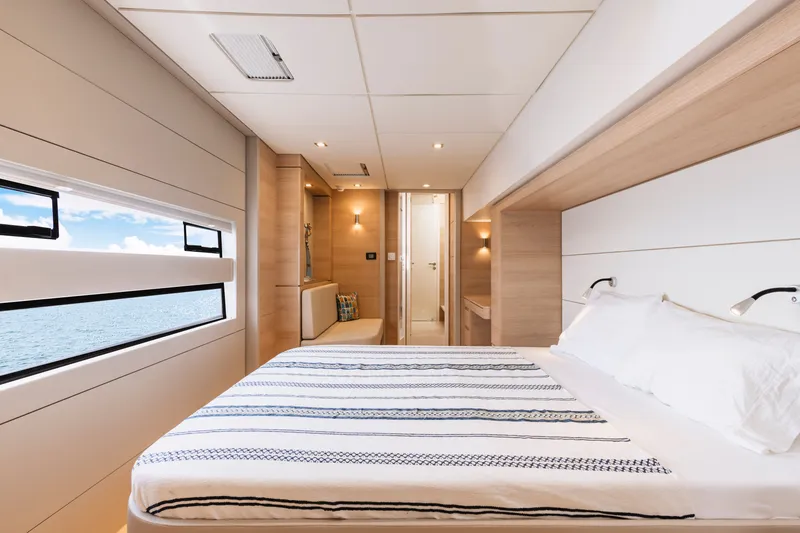 Slide: The Image of Luxurious bedroom interior of 2026 Aventura 56 Motor Yacht with ocean view. - 35