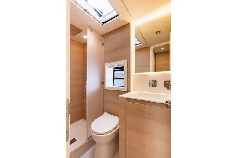 Slide: The Image of Modern bathroom interior of 2026 Aventura 56 Motor Yacht with sleek fixtures and natural lighting. - 33