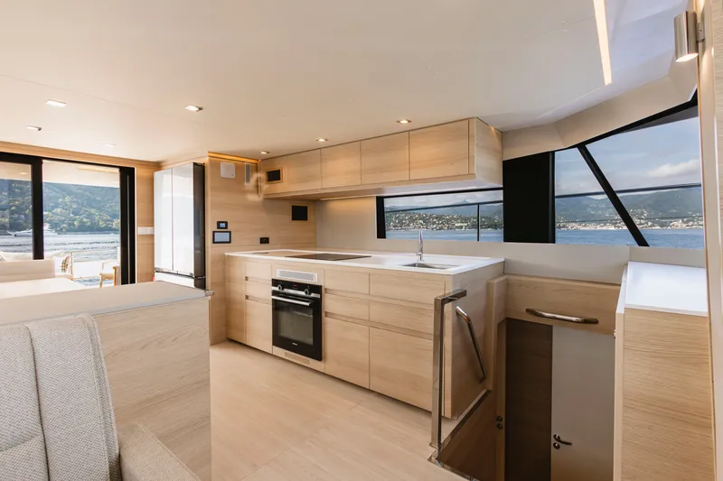 Slide: The Image of Modern kitchen interior of 2026 Aventura 56 Motor Yacht with scenic ocean views. - 15